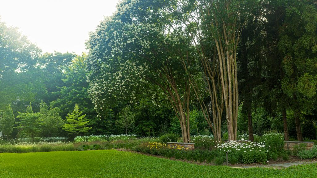 Custom landscape design and outdoor living installation at a Church Road home on the Philadelphia Main Line